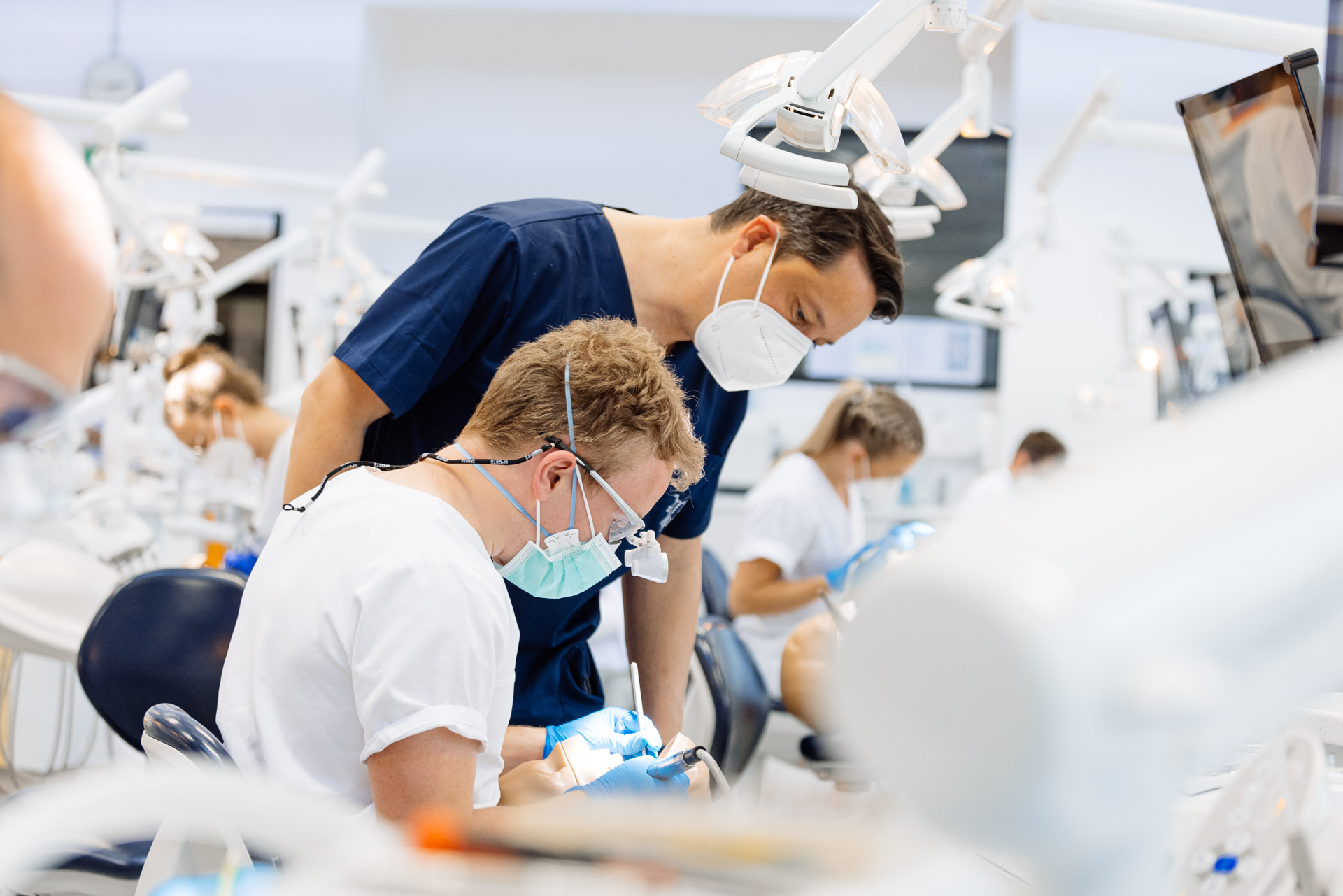 dentist working on dummy